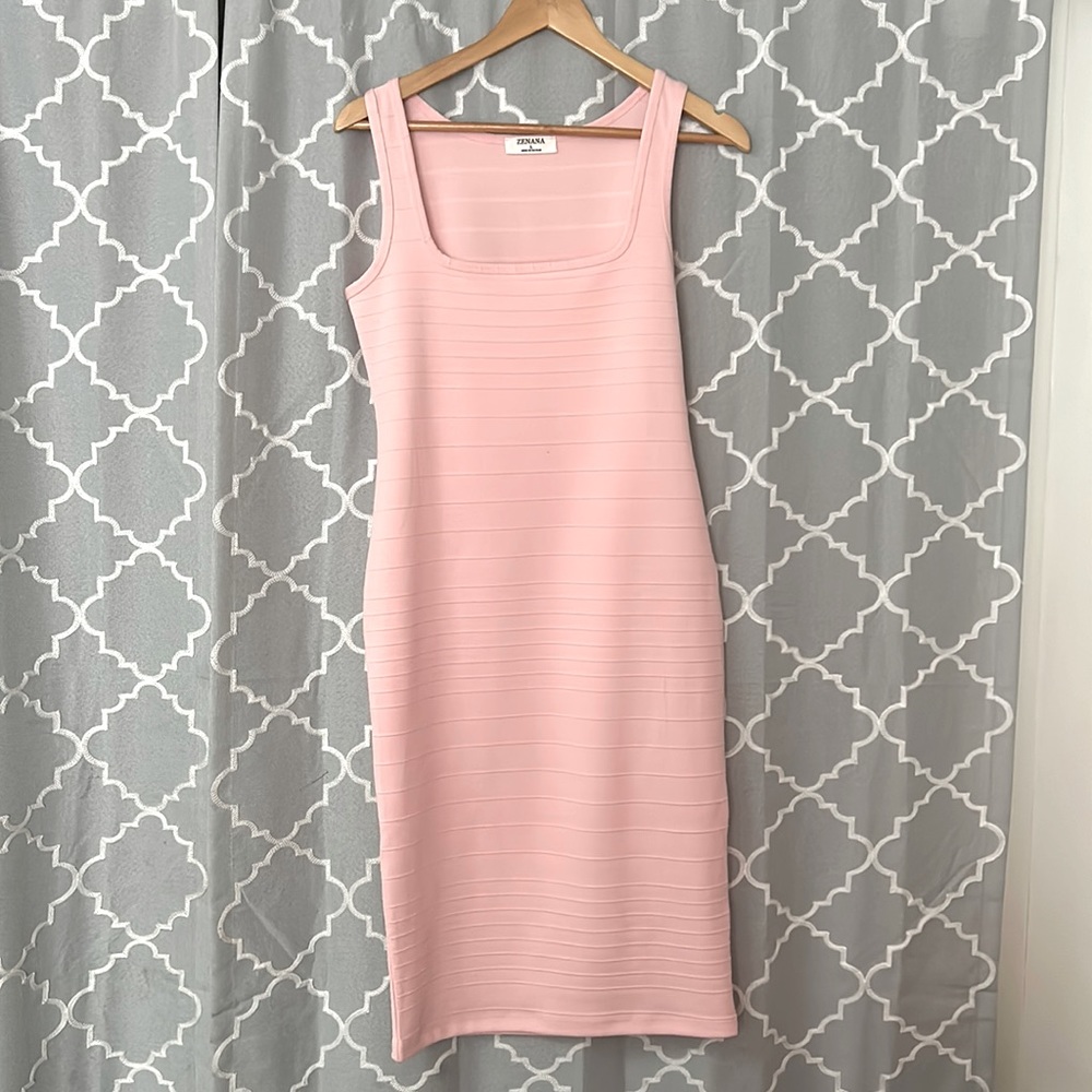Beautiful fitted blush pink dress . Perfect for date night . New with no tags